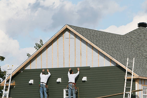 Professional Vinyl Siding technician working in Orient, NY